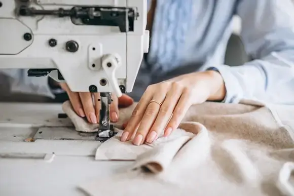 woman working with sewing machine